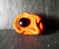 BAGUE EN CUIR FROISSE ORANGE ET HEMATITE